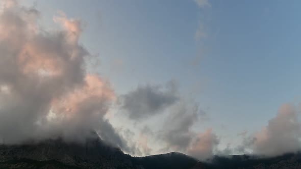 Clouds Float on Top of a Mountain in Crimea. Timelapse