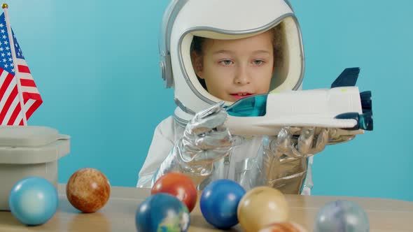 Smiling Child Launches a Space Rocket Closeup a Pilot Traveling in ...