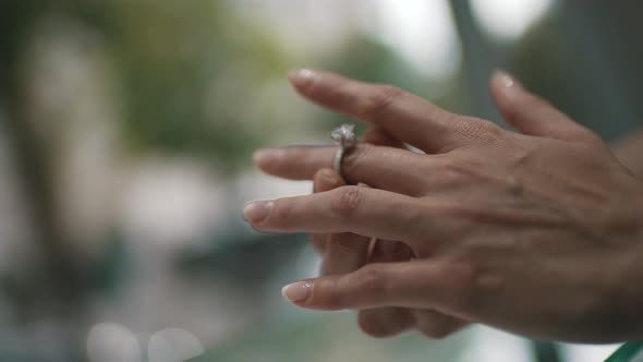 Woman Trying on a Ring Closeup