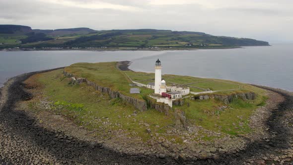The Island of Pladda off the South Coast of Arran in Scotland with a Lighthouse alt