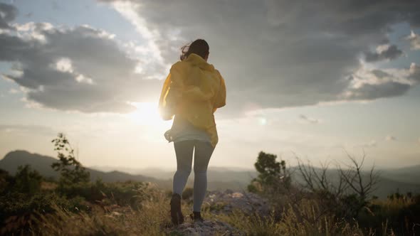 Girl Hiking in the Mountains Slow Motion Video alt