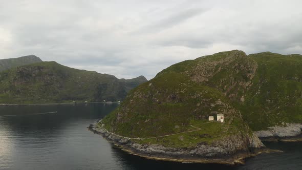 Panorama Of Hendanes Lighthouse With Island Views And Seascape In Maloy, Norway. - aerial alt
