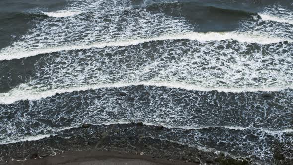 Rough Sea Waters By A Rocky Coast