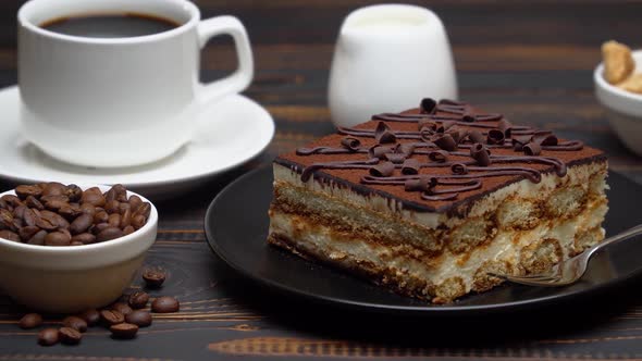 Portion of Traditional Italian Tiramisu Dessert Cup of Espresso Milk  Brown Sugar and Coffee alt