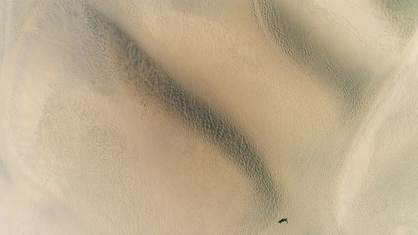 Flying Over Sand Dunes