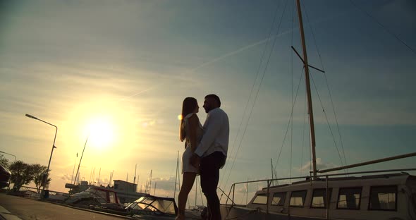 Romantic Couple Having Date on Embankment at Sunset