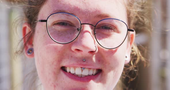 Caucasian volunteer woman in a dog shelter alt