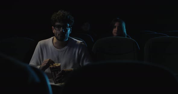 Boy is Watching Movie in the Cinema alt