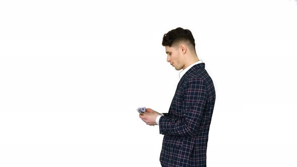 The Man in Formal Outfit Walking in Counting Money on White Background alt
