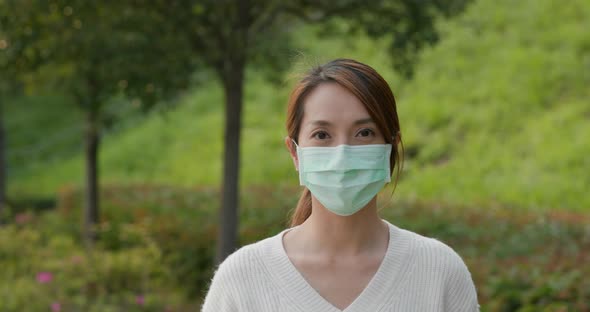Woman wearing medical face mask street