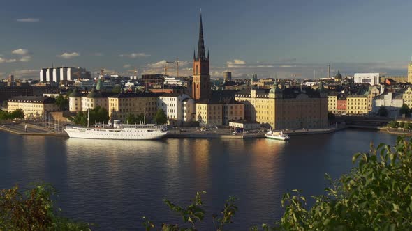Aerial View of the Waterfront of Gamla Stan. Stockholm, Sweden. Zoom Out Shot. alt
