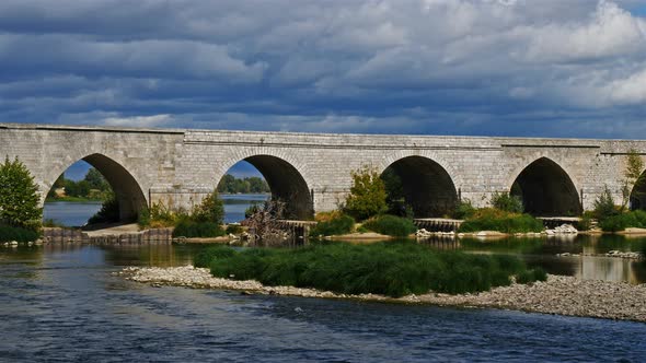 Beaugency, Loiret, France. Stone arched bridge over the river Loire alt