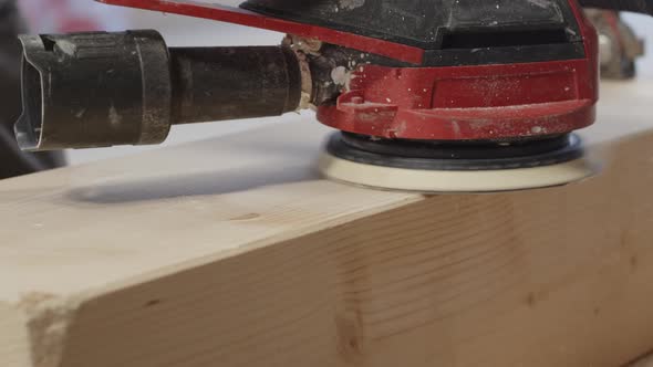 Circular Sanding Machine Sands Wood in a Construction Wood Industry alt