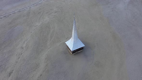  Aerial View of Flooded and Abandoned Church in the Middle of a Lake  alt