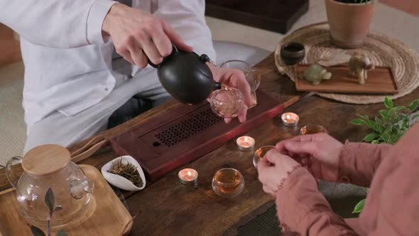 Beautiful Chinese Tea Ceremony with Candle and Decoration alt