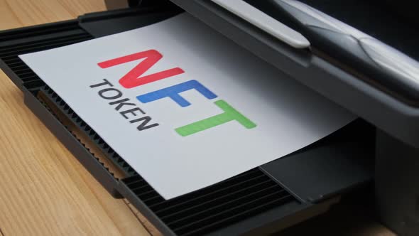 NFT Token Printing Inscription on White Sheet of Paper Printed By a Jet Printer alt