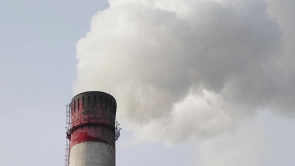 Harmful Smoke From Thermal Power Plant Chimney alt