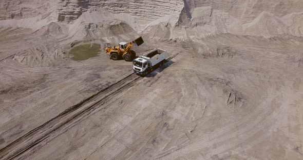 The Work of Loading Equipment in the Sand Quarry