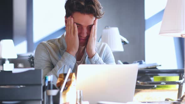 Creative Man Reacting to Failure and Upset by Loss alt