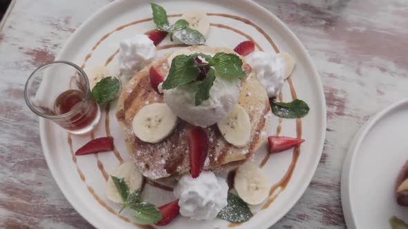 Heavenly Vegan Plant Based Breakfast Brunch Pancakes with Fruits and Maple Syrup alt