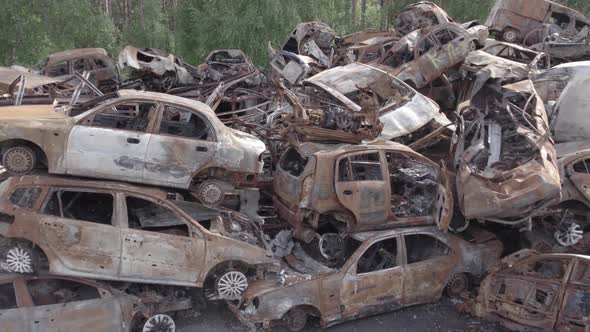 War in Ukraine a Dump of Burned Cars in Irpin Bucha District alt