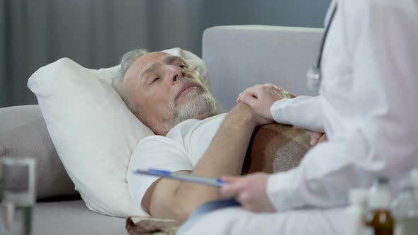 Retired Man Lying in Bed and Chatting With Physician, Healthcare and Medicine alt