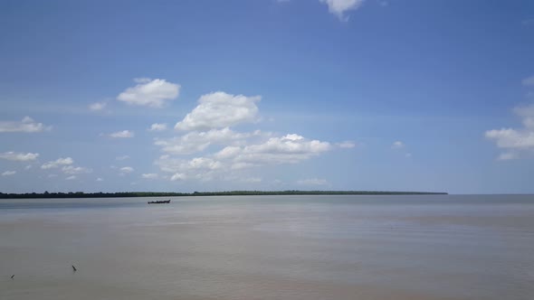 Small boat at the Suriname River  alt