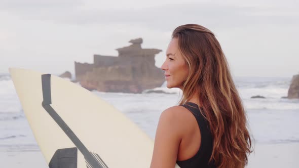 Woman Looking At Ocean alt