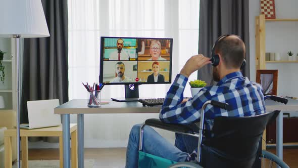 Disabled Person Working Remotely alt