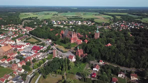 Aerial: The Castle of Frombork in Poland, summer time alt