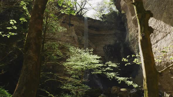 Hidden Waterfall in Tropical Rainforest