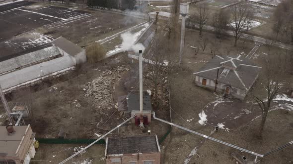 Rotation The Pipe Of A Small Wood Fired Boiler House alt
