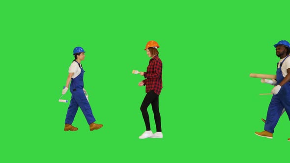 Many People of Different Construction Professions Walking By on a Green Screen Chroma Key alt