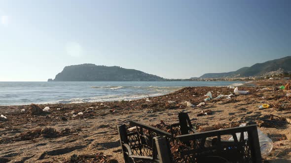 Garbage on dirty beach alt