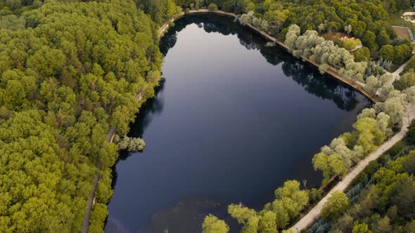 Bird Eye Zoom Descend to Caldera Dark Lake