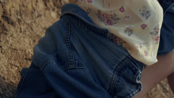 Stylish Curly Woman Relax on Sand Seashore Wearing Sunglasses Close Up alt