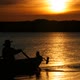 Silhouette of man rowing on Boat at Sunset - VideoHive Item for Sale