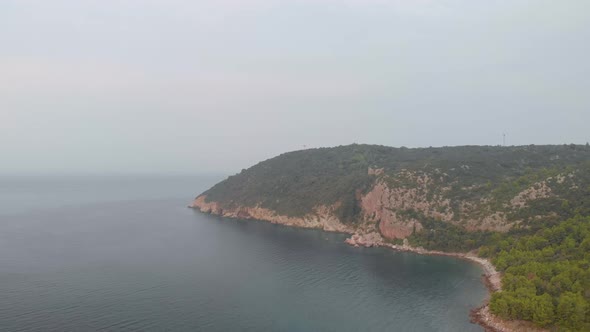 Cinematic slow motion drone footage of adriatic sea in Sutomore Montenegro. alt