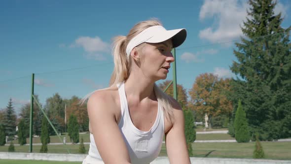 Pro Tennis Player Hits the Ball with a Racket Practice Game on the Tennis Court Young Woman Serving alt
