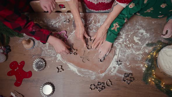 Cute Children Making Cookies with Mother on Christmas Day at Home alt