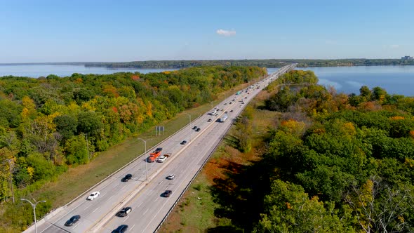 Trans-Canada highway, Lake of Two Mountains Bridge and fall season colors in the suburbs of Montreal