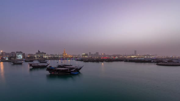 Evening at Doha Bay Day to Night Timelapse with Traditional Wooden Dhow Fishing Boats alt