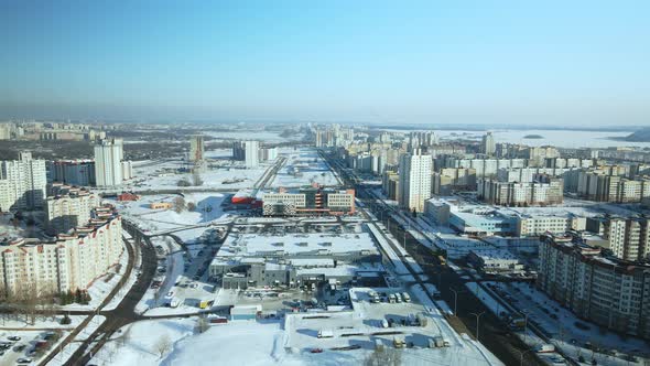 City quarters. Multi-story houses. Winter cityscape. alt