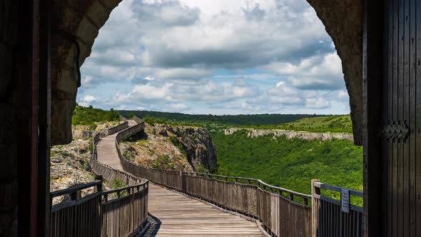 Time lapse with moving clouds over the medieval fortress alt