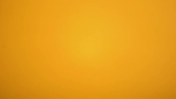 Happy Easter Inscription and Basket With Colored Eggs on Yellow Background, Fest alt