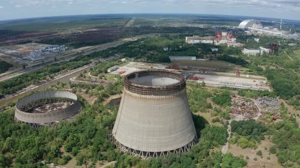 Drone Flight Over Cooling Towers Near Power Plant alt