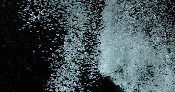 900441 Bubbles of Air in the Water on Black Background, Slow Motion 4K alt