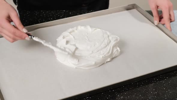 Pastry Chef Fills Cream Brownies with Pastry Bag alt