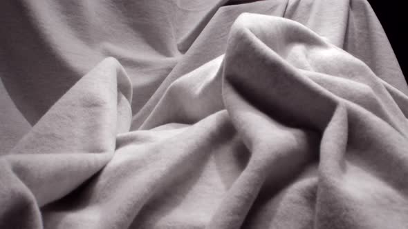 Push In on a Grey Blanket Thrown Carelessly  on a Chair, Artistic Shot alt