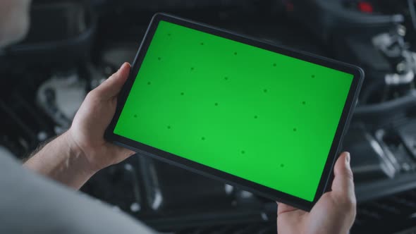 Car Service Mechanic with Tablet alt